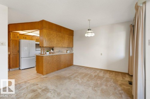Edmonton, AB - Indoor Photo Showing Kitchen