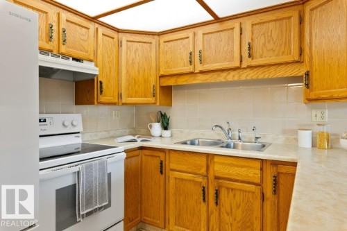 Edmonton, AB - Indoor Photo Showing Kitchen With Double Sink