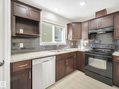 17724 6 Avenue, Edmonton, AB - Indoor Photo Showing Kitchen With Double Sink