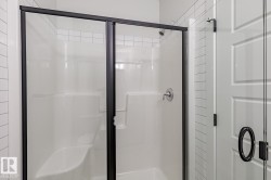 Bathroom with a shower stall - 