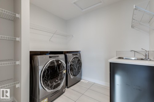 3719 42 Avenue, Beaumont, AB - Indoor Photo Showing Laundry Room