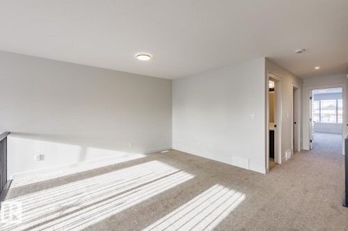 Spare room with carpet flooring and recessed lighting - 3719 42 Avenue, Beaumont, AB - Indoor Photo Showing Other Room