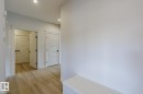 Hall featuring light wood-style floors and recessed lighting - 3719 42 Avenue, Beaumont, AB  - Indoor Photo Showing Other Room 