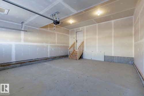 View of garage - 3719 42 Avenue, Beaumont, AB - Indoor Photo Showing Garage
