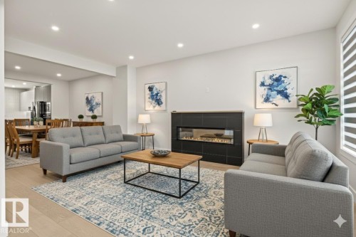 2-8343 Saskatchewan Drive, Edmonton, AB - Indoor Photo Showing Living Room With Fireplace