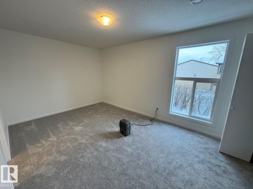 23 3111 142 Avenue, Edmonton, AB - Indoor Photo Showing Other Room