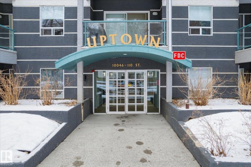 Snow covered property entrance featuring french doors - 506 10046 110 Street, Edmonton, AB - Outdoor With Balcony