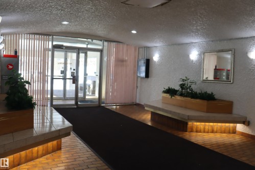 #203 9028 Jasper Ave Nw, Edmonton, AB - Indoor Photo Showing Other Room