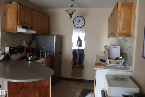 #203 9028 Jasper Ave Nw, Edmonton, AB - Indoor Photo Showing Kitchen