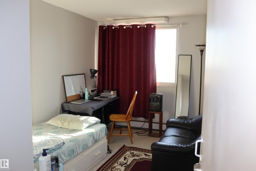 #203 9028 Jasper Ave Nw, Edmonton, AB - Indoor Photo Showing Bedroom