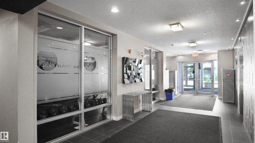 Lobby with a textured ceiling - 105 2584 Anderson Way, Edmonton, AB - Indoor Photo Showing Other Room