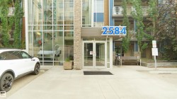 Entrance to property featuring stone siding and french doors - 