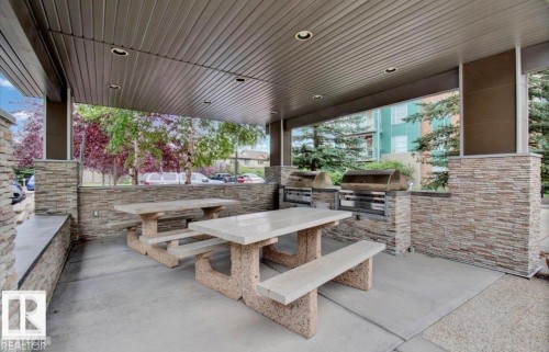 View of patio featuring an outdoor kitchen / dining area - 105 2584 Anderson Way, Edmonton, AB - Outdoor With Deck Patio Veranda