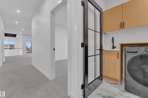 27 Eldridge Point(E), St. Albert, AB - Indoor Photo Showing Laundry Room