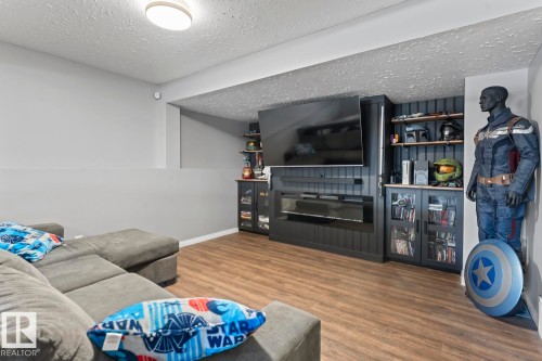 1927 6 Street, Cold Lake, AB - Indoor Photo Showing Other Room With Fireplace