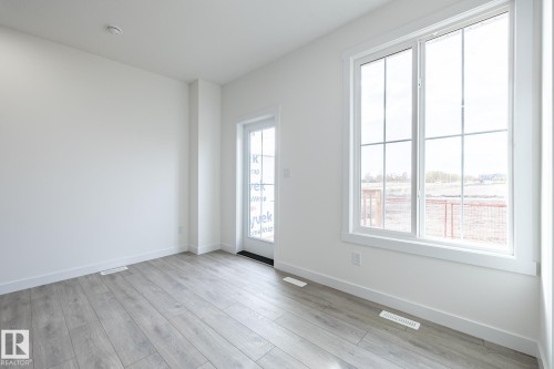 25 7110 Keswick Common, Edmonton, AB - Indoor Photo Showing Other Room