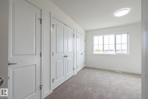 25 7110 Keswick Common, Edmonton, AB - Indoor Photo Showing Other Room