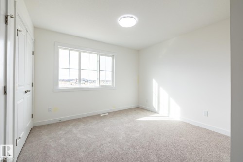 25 7110 Keswick Common, Edmonton, AB - Indoor Photo Showing Other Room