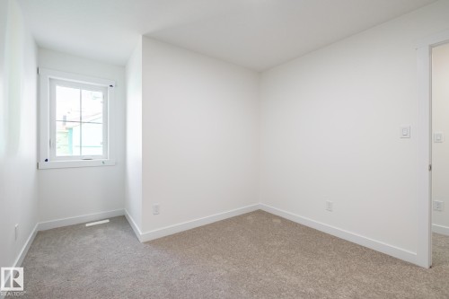 25 7110 Keswick Common, Edmonton, AB - Indoor Photo Showing Other Room