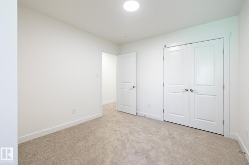 25 7110 Keswick Common, Edmonton, AB - Indoor Photo Showing Other Room