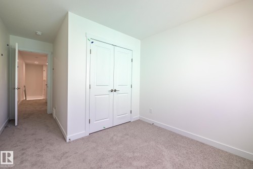 25 7110 Keswick Common, Edmonton, AB - Indoor Photo Showing Other Room