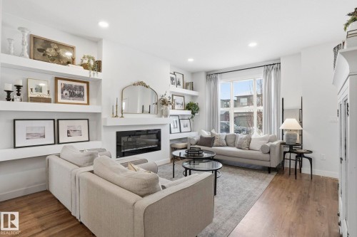 74 Garneau Gate, Spruce Grove, AB - Indoor Photo Showing Living Room With Fireplace