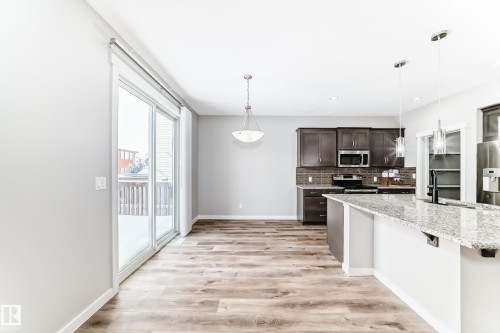 Edmonton, AB - Indoor Photo Showing Kitchen With Stainless Steel Kitchen With Upgraded Kitchen