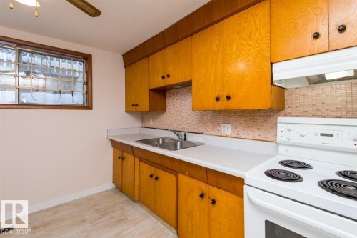 9850 81 Avenue, Edmonton, AB - Indoor Photo Showing Kitchen With Double Sink