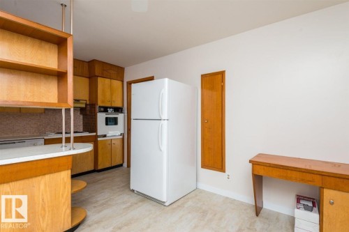 9850 81 Avenue, Edmonton, AB - Indoor Photo Showing Kitchen With Double Sink