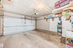 Garage featuring a garage door opener - 