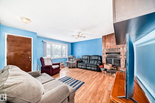 13444 61 Street, Edmonton, AB - Indoor Photo Showing Living Room With Fireplace