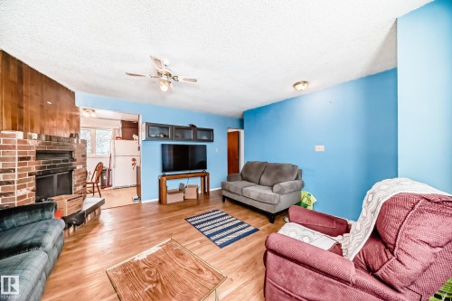 13444 61 Street, Edmonton, AB - Indoor Photo Showing Living Room With Fireplace