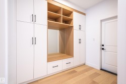 Mudroom featuring light wood-style flooring - 