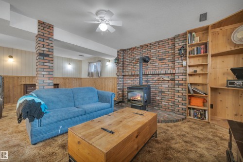 4314 39 Avenue, Leduc, AB - Indoor Photo Showing Living Room With Fireplace