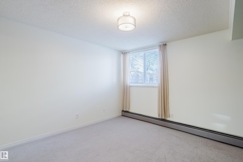 106 11217 103 Avenue, Edmonton, AB - Indoor Photo Showing Other Room