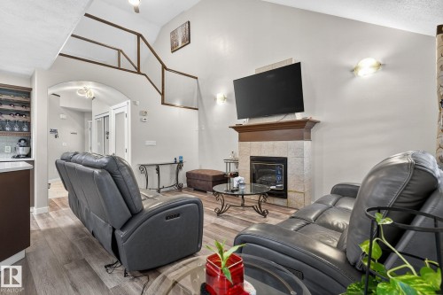 3 1920 Millwoods Road E, Edmonton, AB - Indoor Photo Showing Living Room With Fireplace