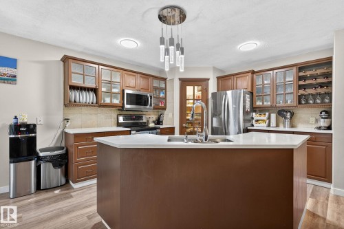 3 1920 Millwoods Road E, Edmonton, AB - Indoor Photo Showing Kitchen With Double Sink