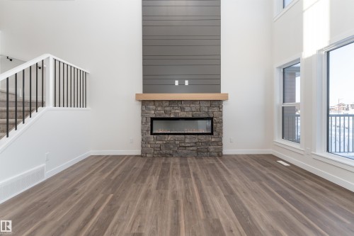 6 Tenuto Link, Spruce Grove, AB - Indoor Photo Showing Living Room With Fireplace