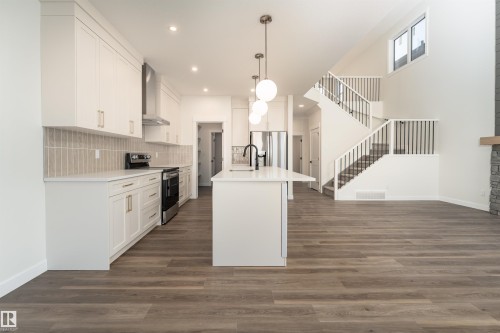 6 Tenuto Link, Spruce Grove, AB - Indoor Photo Showing Kitchen With Upgraded Kitchen