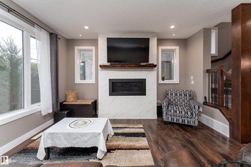 10706 67 Avenue, Edmonton, AB - Indoor Photo Showing Living Room With Fireplace