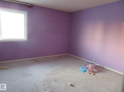 Unfurnished room with baseboards - 