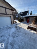 View of home's exterior featuring stucco siding - 