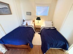 Bedroom with wood finished floors - 