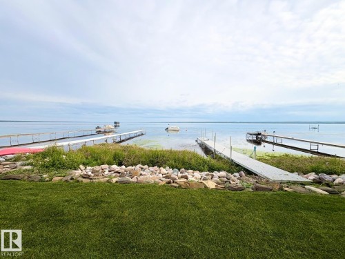 Water view with a boat dock - A15 Wicks Street, Rural Leduc County, AB - Outdoor With Body Of Water With View