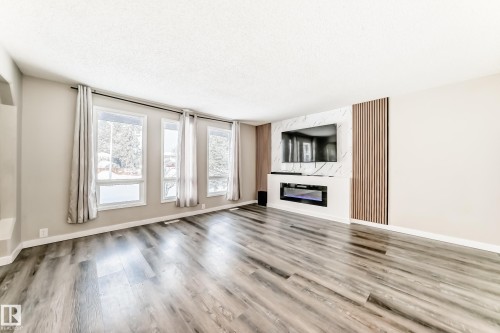 72 Howson Crescent, Edmonton, AB - Indoor Photo Showing Other Room With Fireplace