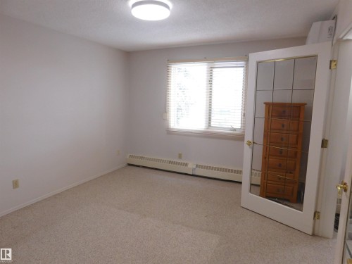 210 10945 21 Avenue, Edmonton, AB - Indoor Photo Showing Other Room