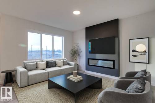 907 18 Avenue, Edmonton, AB - Indoor Photo Showing Living Room With Fireplace