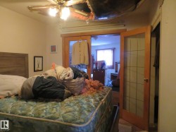 Bedroom featuring ceiling fan - 