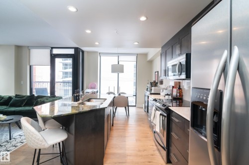 304 11933 Jasper Avenue, Edmonton, AB - Indoor Photo Showing Kitchen With Upgraded Kitchen