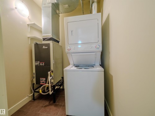 304 11933 Jasper Avenue, Edmonton, AB - Indoor Photo Showing Laundry Room